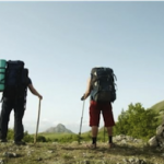 "Hikers on stony terrain"