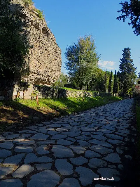 "Ruins of great buildings along the road to Rome"
